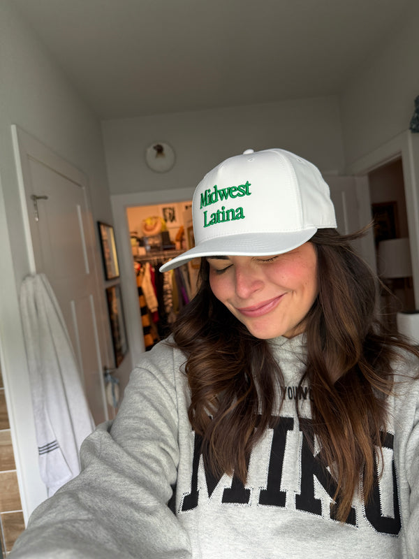 White cap with green logo