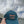 Teal cap with peach logo